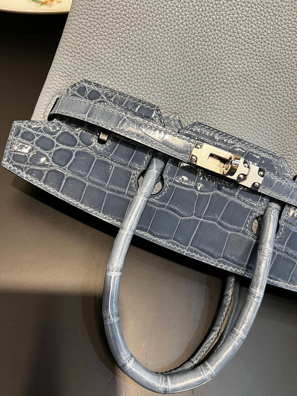 Side view of fluid structured handbag