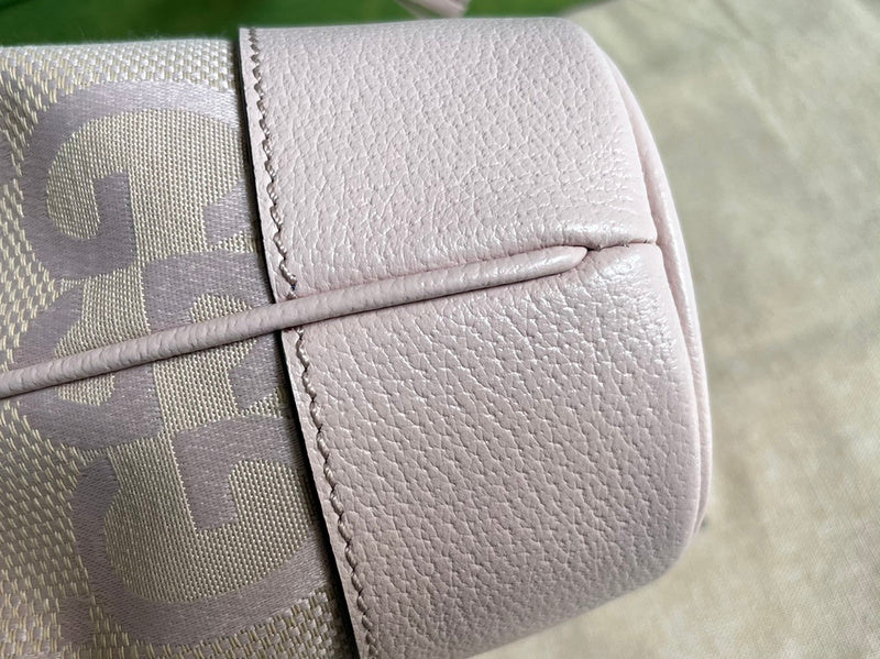 Handle and strap detail of modern chic women's handbag – women's luxury accessory