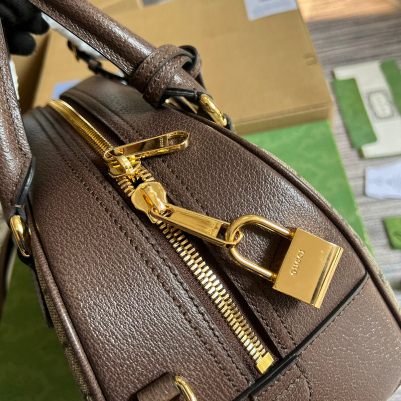 Side view of polished structured handbag