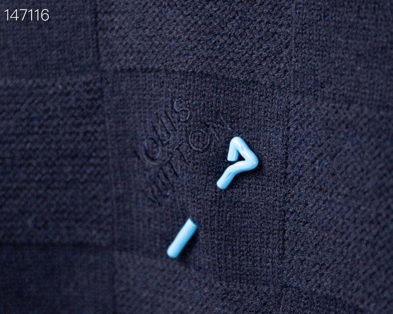 Full styled look of Louis Vuitton luxury clothing with tailored silhouette
