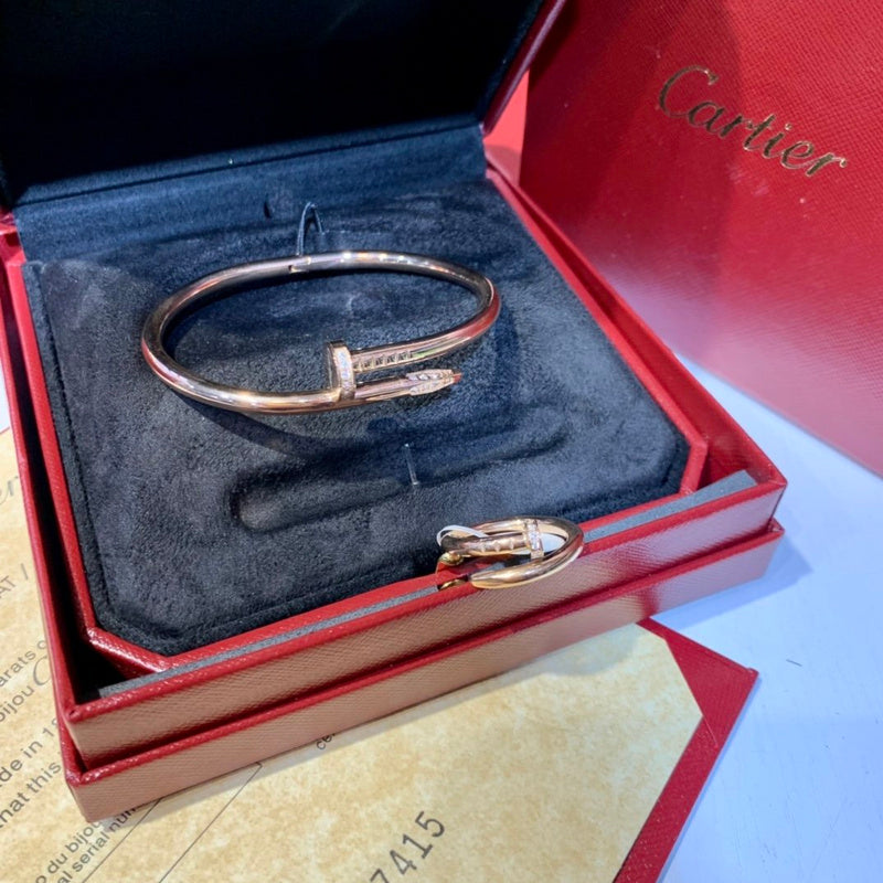 Close-up detail view of Cartier unisex jewelry piece