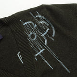 Flat lay presentation of Louis Vuitton luxury clothing with relaxed-fit cut