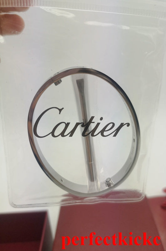 Close-up detail view of Cartier unisex jewelry piece