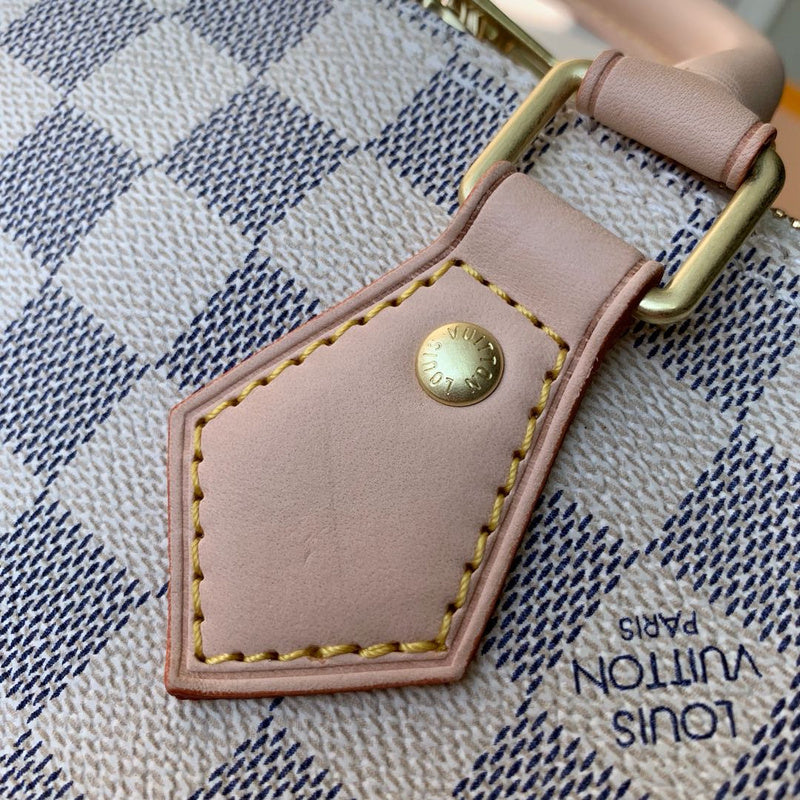 Back view of sleek classic women's handbag – women's statement bag