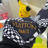 Front view of Louis Vuitton luxury clothing with runway-inspired design