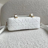 Styled lifestyle shot of sleek everyday-luxe women's handbag – women's designer-style accessory