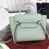 Side profile of refined modern women's handbag – women's statement bag