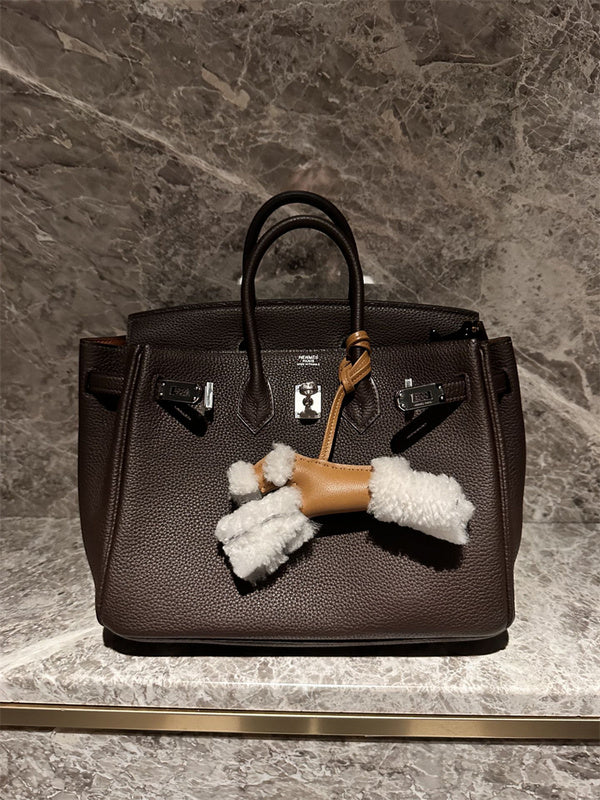 Side view of modern structured handbag