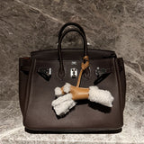 Side view of modern structured handbag
