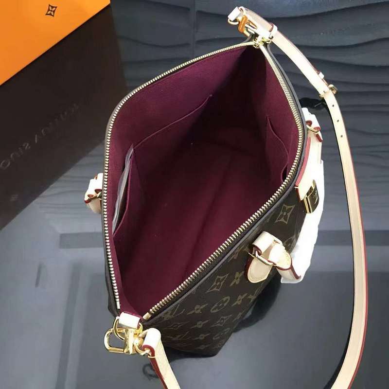 Side profile of chic polished women's handbag – women's everyday handbag