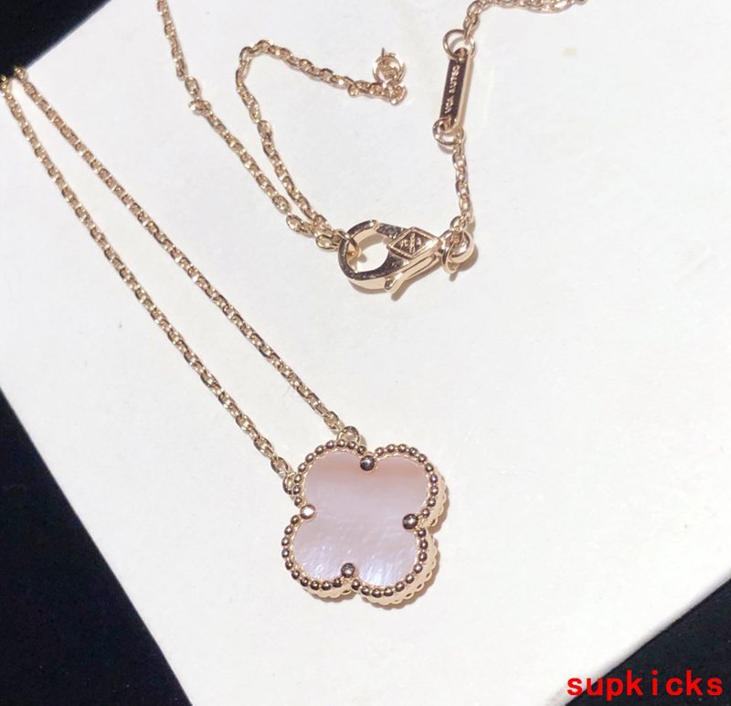 Lifestyle view of Van Cleef & Arpels unisex jewelry piece