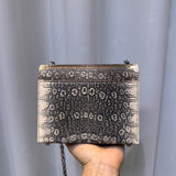  top-handle bag close-up of hardware and finish 17