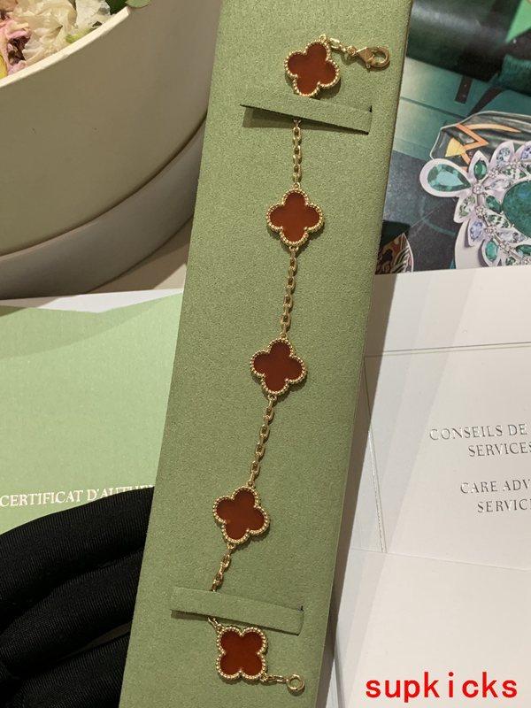 Lifestyle view of Van Cleef & Arpels unisex jewelry piece