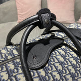 Handle and strap detail of structured statement women's handbag – women's luxury accessory