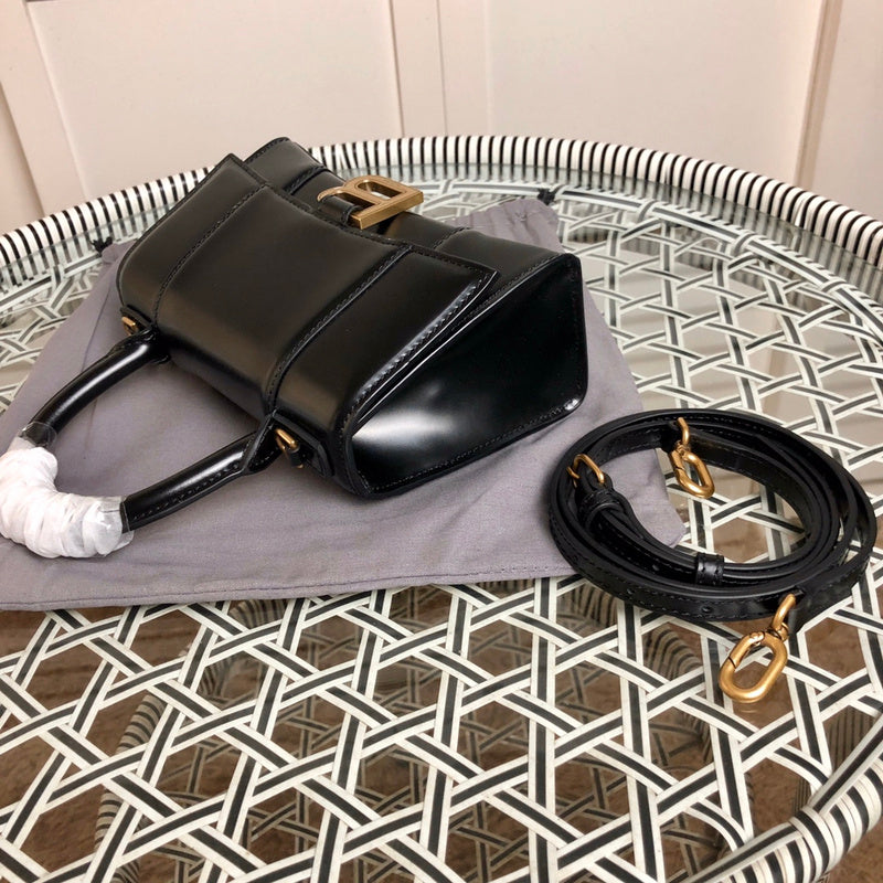 Styled lifestyle shot of chic sleek women's handbag – women's luxury accessory