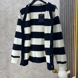 Side profile of Louis Vuitton luxury clothing with label-forward styling