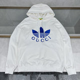 Front view of Gucci luxury clothing with monogram-inspired silhouette