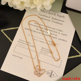 Side view of Van Cleef & Arpels unisex jewelry piece