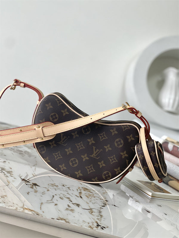  Polished crossbody bag carried on shoulder