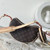  Polished crossbody bag carried on shoulder
