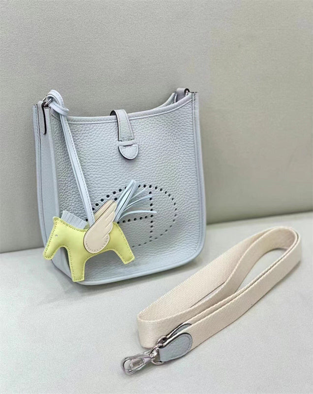 Modern top-handle bag carried on shoulder 22