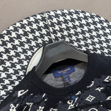 Flat lay presentation of Louis Vuitton luxury clothing with everyday silhouette