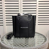 Front view of refined everyday-luxe women's handbag – women's luxury accessory