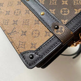 Front view of sleek structured women's handbag – women's statement bag