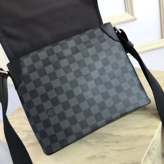 Top view of classic statement women's handbag – women's luxury accessory