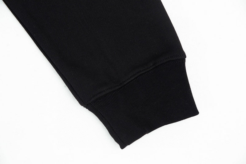 Back view of Louis Vuitton luxury clothing with signature branding