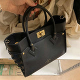  statement top-handle bag detail view showing craftsmanship 8
