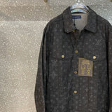 Back view of Louis Vuitton luxury clothing with label-forward styling