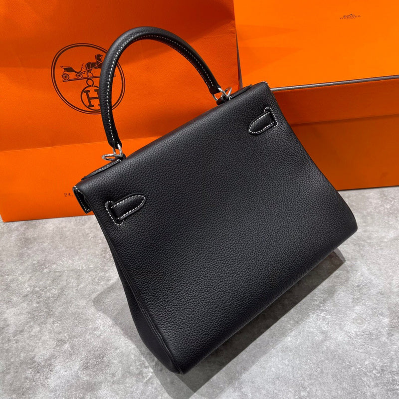 Side view of structured structured handbag