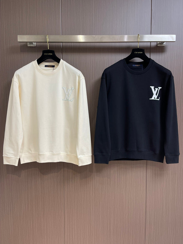 Close-up detail shot of Louis Vuitton luxury clothing with logo-detail design