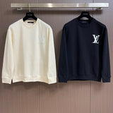 Close-up detail shot of Louis Vuitton luxury clothing with logo-detail design