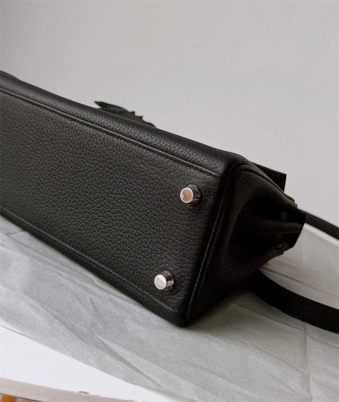  timeless top-handle bag detail view showing craftsmanship 8