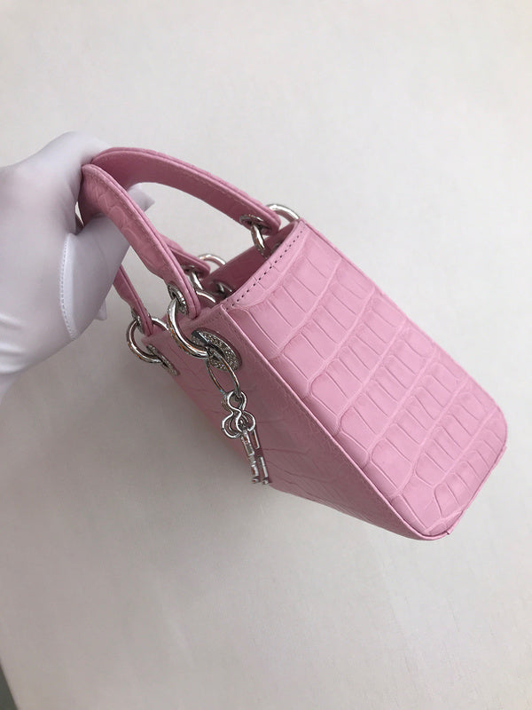 Side profile of signature sleek women's handbag – women's designer-style accessory