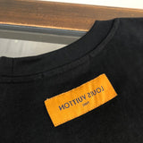 Close-up detail shot of Louis Vuitton cotton t-shirt with streetwear-inspired cut