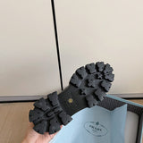 Texture and finish detail of Prada luxury piece style No.125