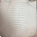 Side view of timeless structured handbag