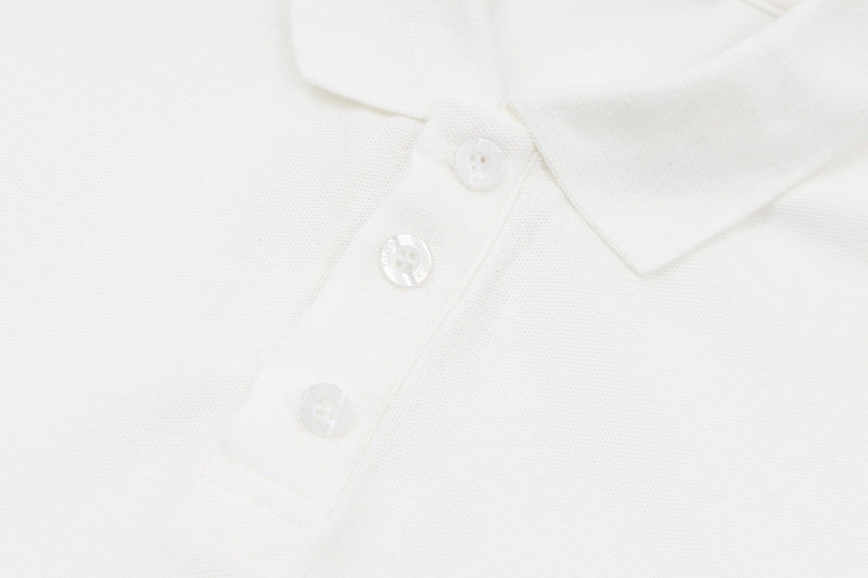 Close-up detail shot of Polo cotton polo shirt with logo-detail design