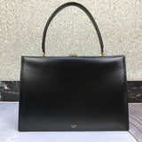 Close-up detail of premium polished women's handbag – women's designer-style accessory