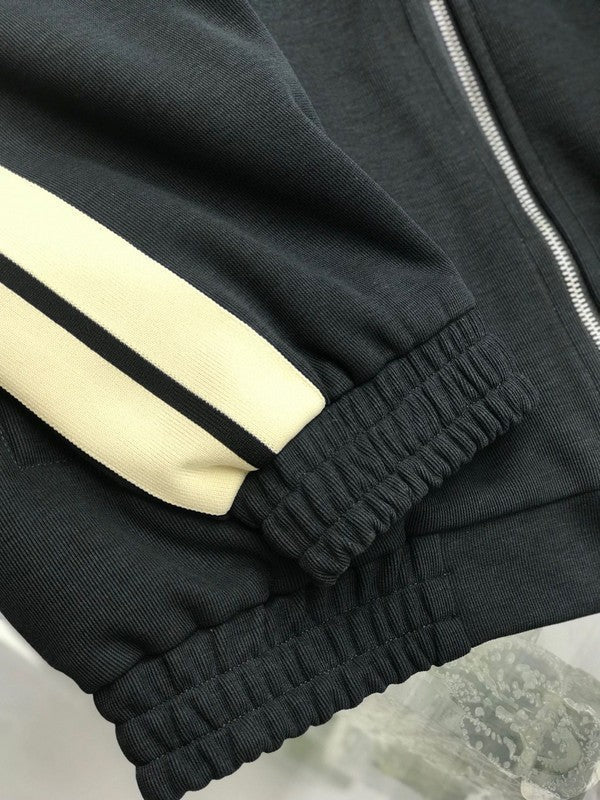 Close-up detail shot of Louis Vuitton luxury clothing with tailored silhouette