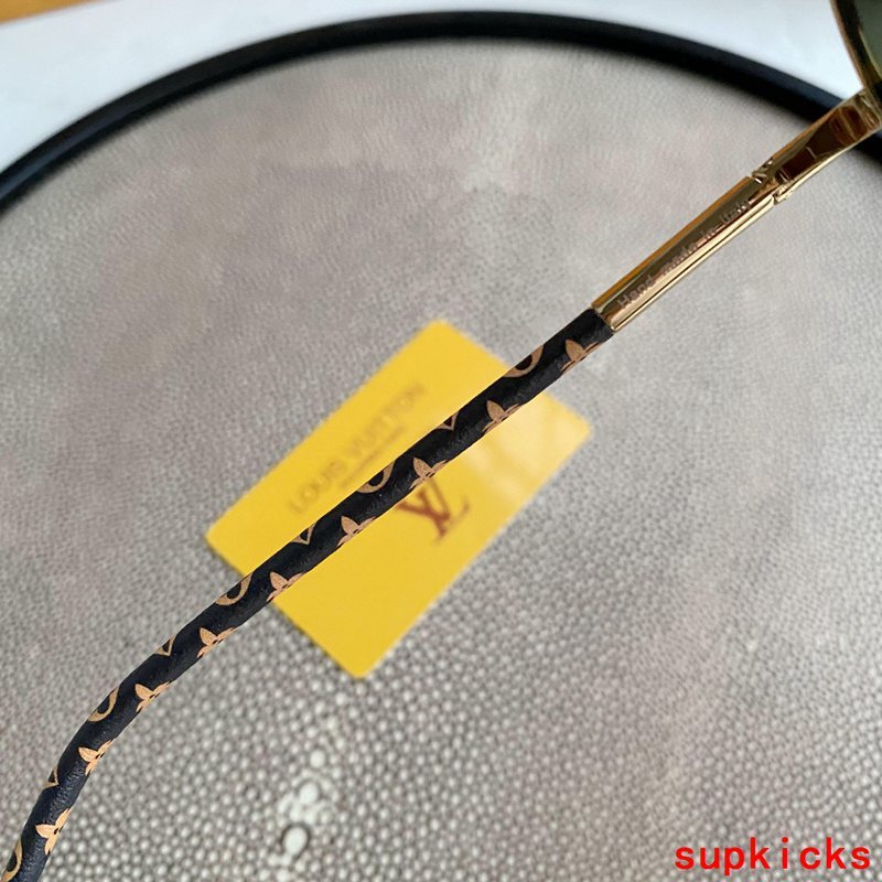 Close-up detail view of Louis Vuitton unisex sunglasses