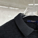 Close-up detail shot of Louis Vuitton luxury clothing with runway-inspired design