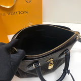 Front view of premium chic women's handbag – women's luxury handbag