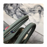 Side view of chic structured handbag