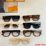Close-up detail view of Louis Vuitton unisex sunglasses