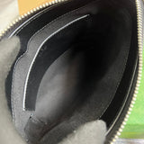 Close-up detail of modern signature women's handbag – women's designer-style accessory