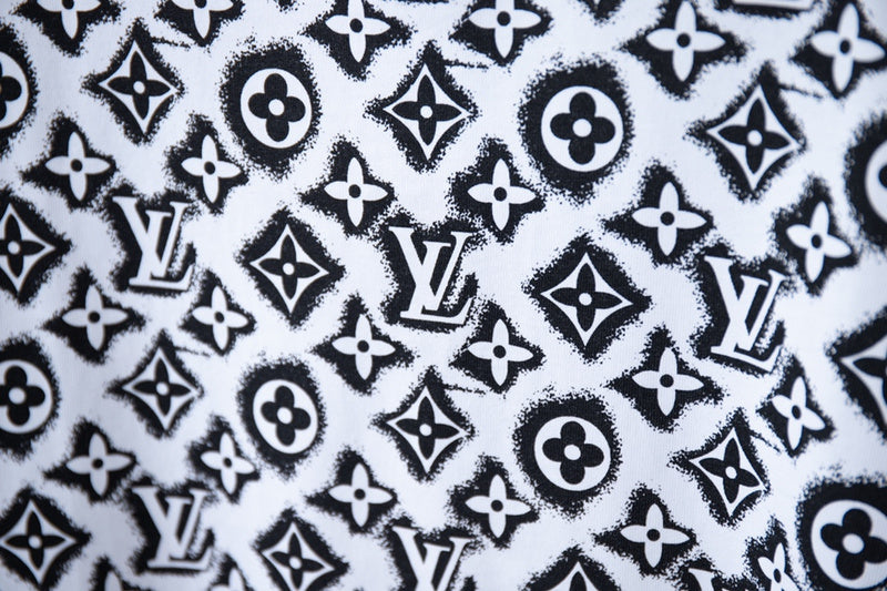 Flat lay presentation of Louis Vuitton cotton t-shirt with monogram-inspired silhouette